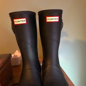 Matte black tall Hunter boots